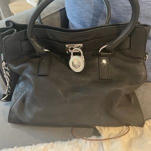 Michael Kors black leather handbag